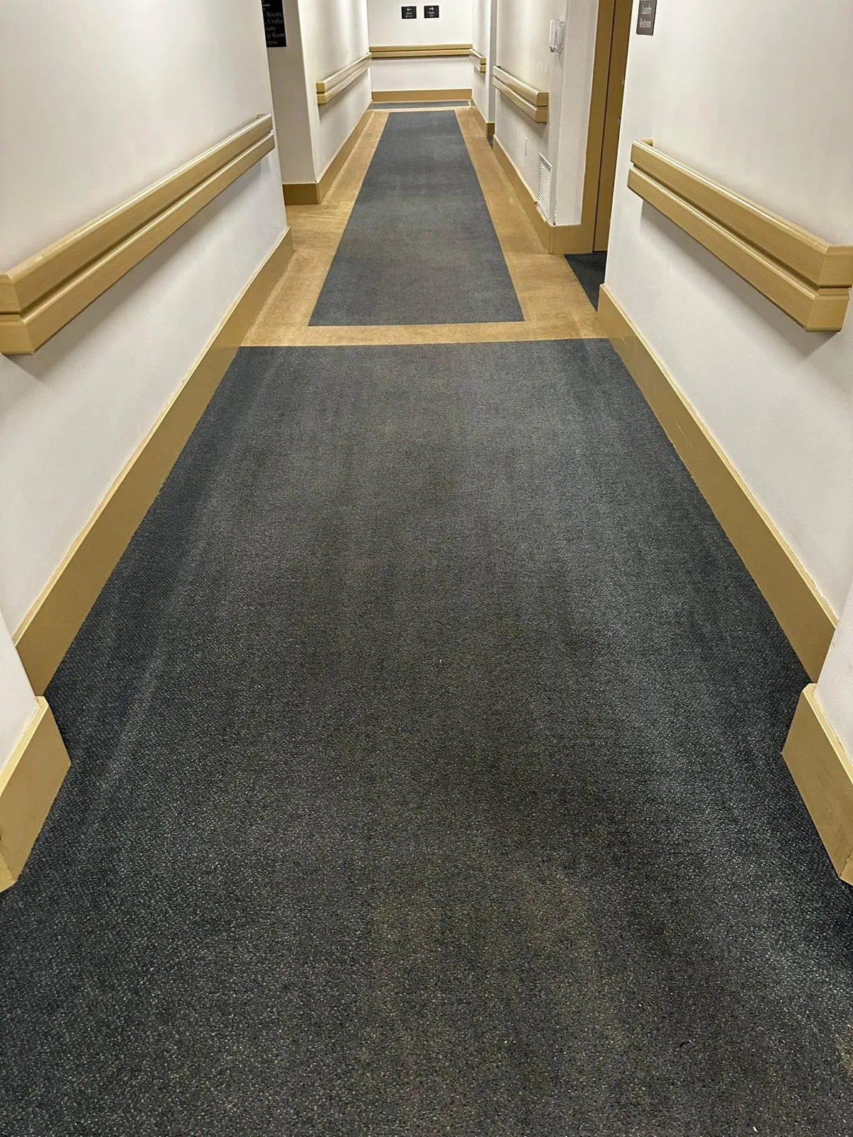 Commercial corridor carpet installation in a Phoenix AZ facility by RDC Renovation