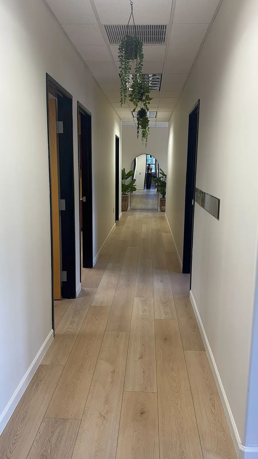 Wood-look plank flooring in a commercial office corridor installed by RDC Renovation in Phoenix AZ