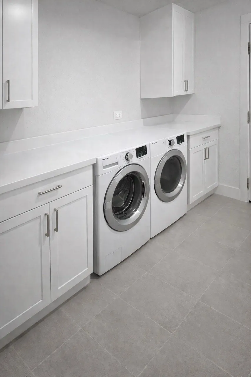 Laundry room remodel with white quartz countertop and gray tile floor Phoenix AZ