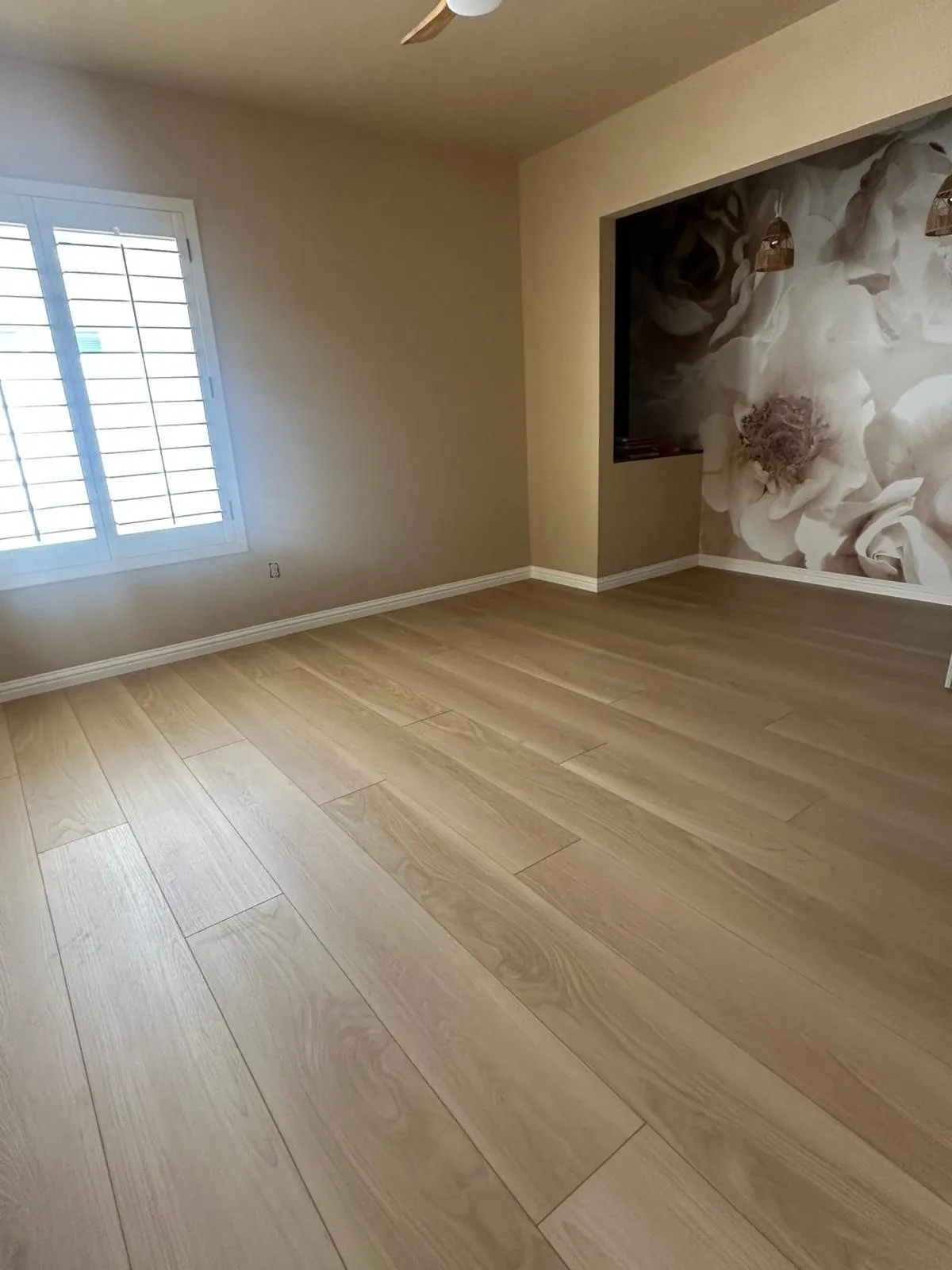 Light LVP flooring in bedroom with cloud mural accent wall nook Phoenix AZ
