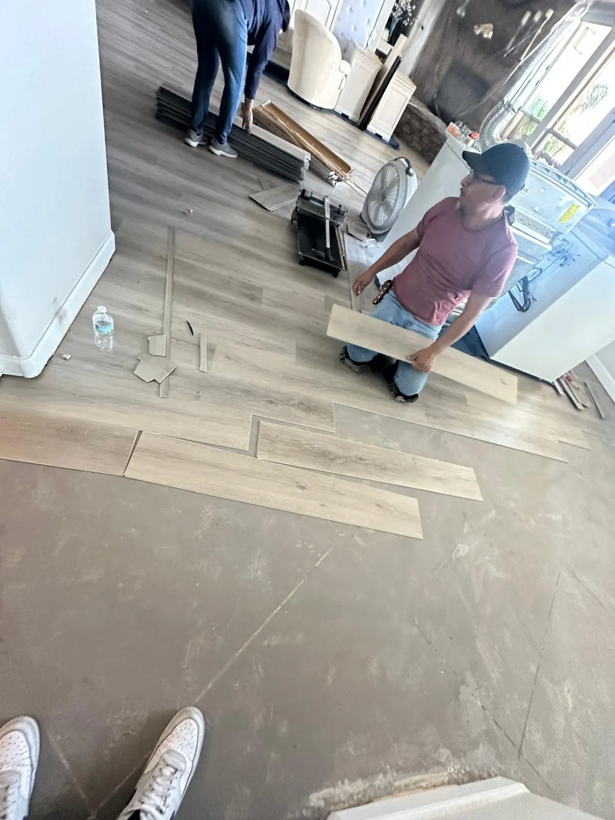 LVP plank flooring being installed in a Scottsdale, AZ home by RDC Renovation, job in progress