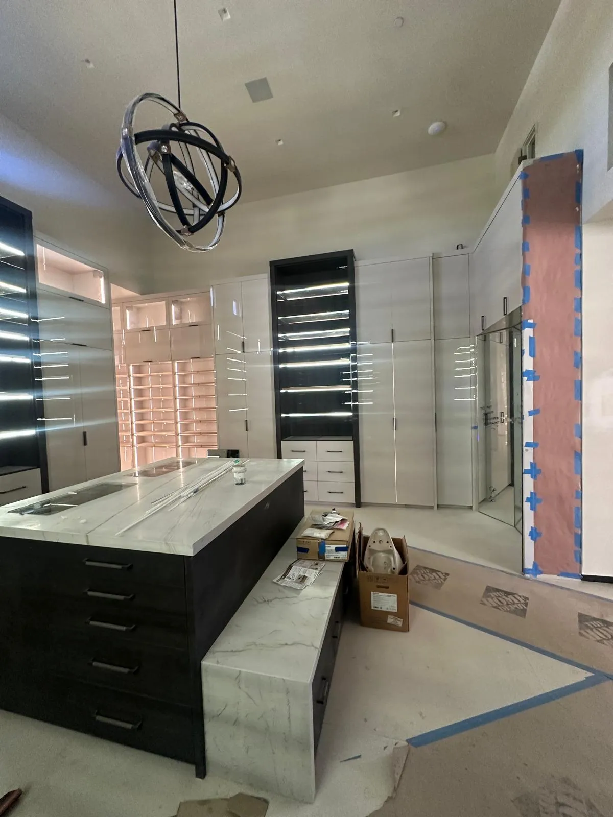 Primary bathroom remodel in progress with a new vanity and tiled shower in Phoenix AZ by RDC Renovation