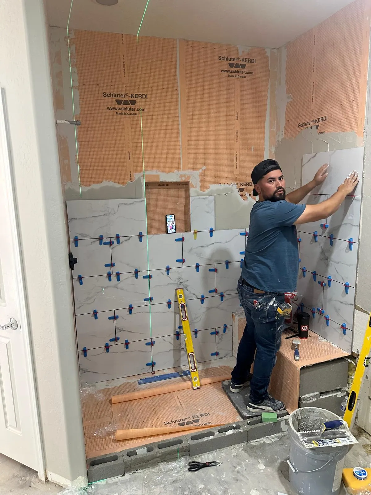 Schluter-Kerdi waterproofing membrane on shower walls with tile being set over it, Phoenix AZ
